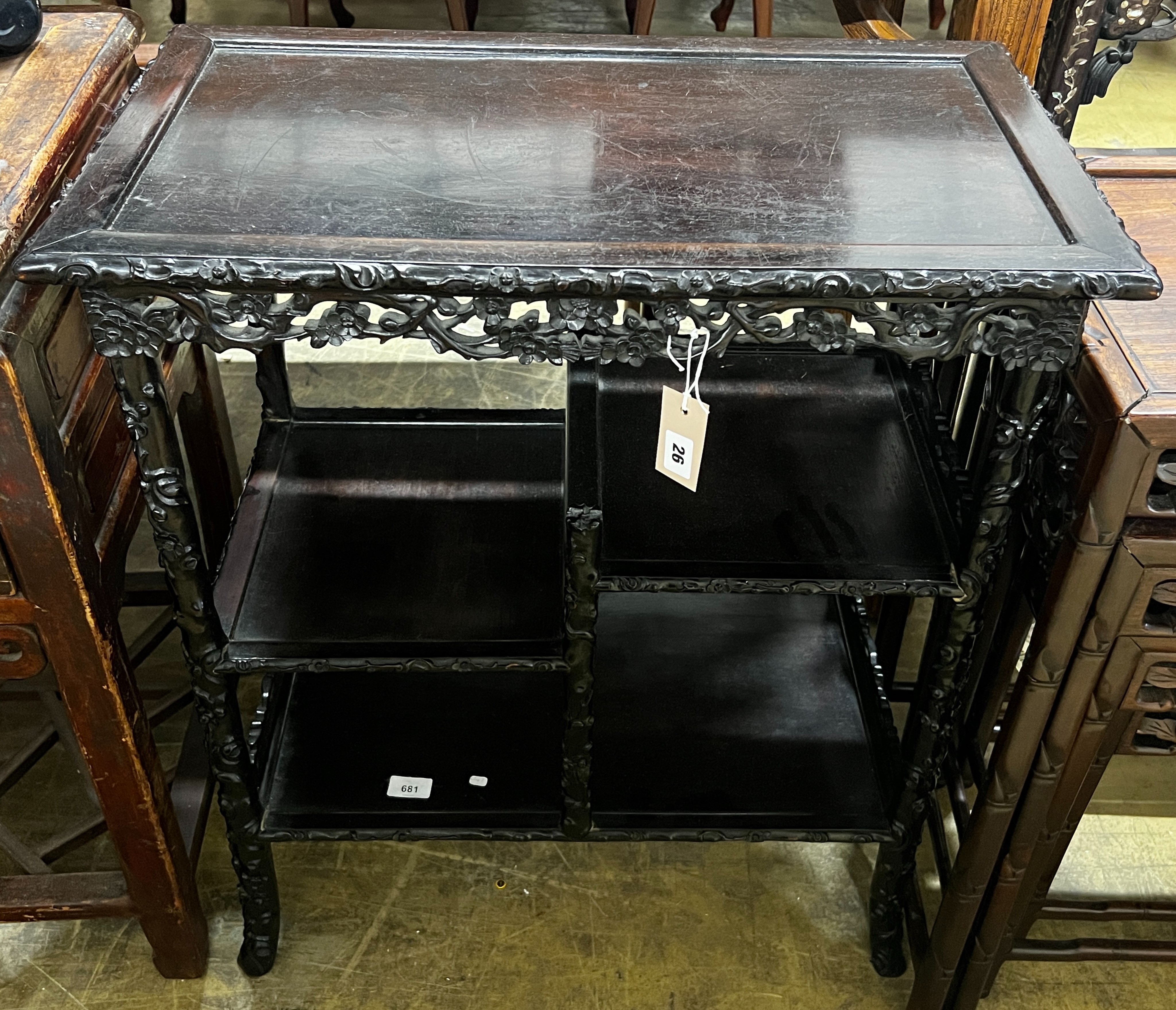 A Chinese rectangular carved hongmu tiered display table, length 67cm, depth 38cm, height 78cm *Please note the sale commences at 9am.